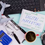 E6media Digital Marketing Podcast - notepad and desk with digital marketing planning